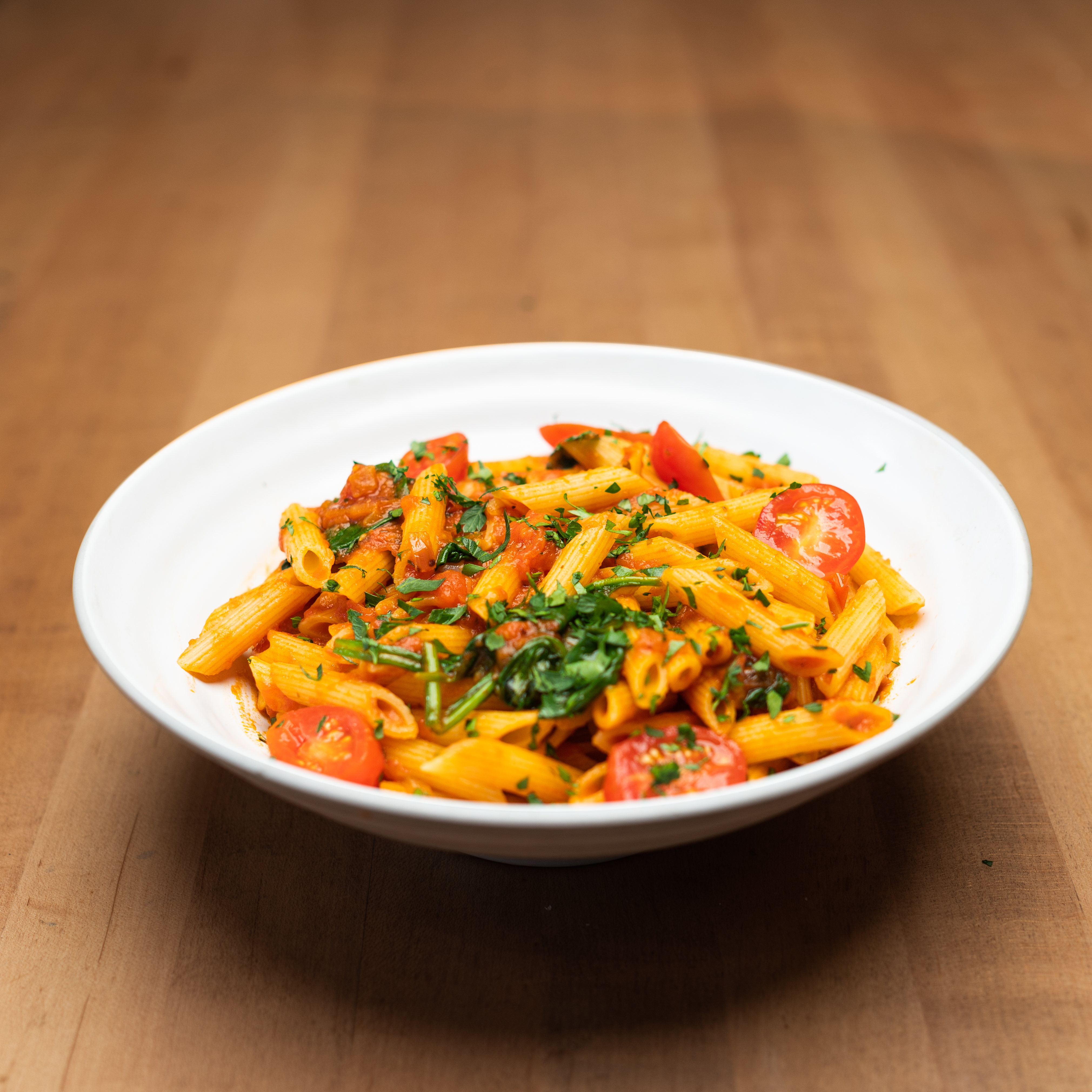 Penne Rouge - Our signature tomato sauce tossed with penne, saut...